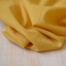 Tissu au mètre voile de coton jaune moutarde