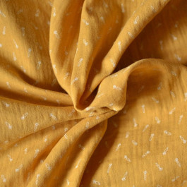 Tissu double-gaze jaune moutarde avec impression carotte en coton Bio