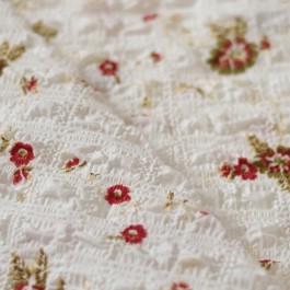 Tissu seersucker blanc fleurs rouge
