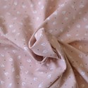 Tissu jersey coton Bio plumes blanches fond rose