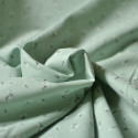 Tissu popeline fine lawn imprimée fleurs blanches fond vert sauge
