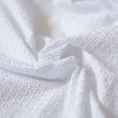 Tissu broderie anglaise en coton blanc au mètre