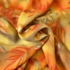 Tissu fleurs orange, vert et jaune polyester