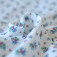 Tissu double-gaze fleurs bleu rouge en coton Bio écologique
