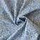 Tissu fleurs d'automne sur bleu style chambray en coton Bio