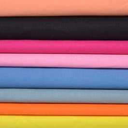 Tissu coton jaune 025, orange 026, gris 014, lavande 022, rose 006, fushia 007, noir 009 et pêche 035 