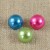 Bouton perle demi-boule bleu, rose ou vert 9 mm sur pied